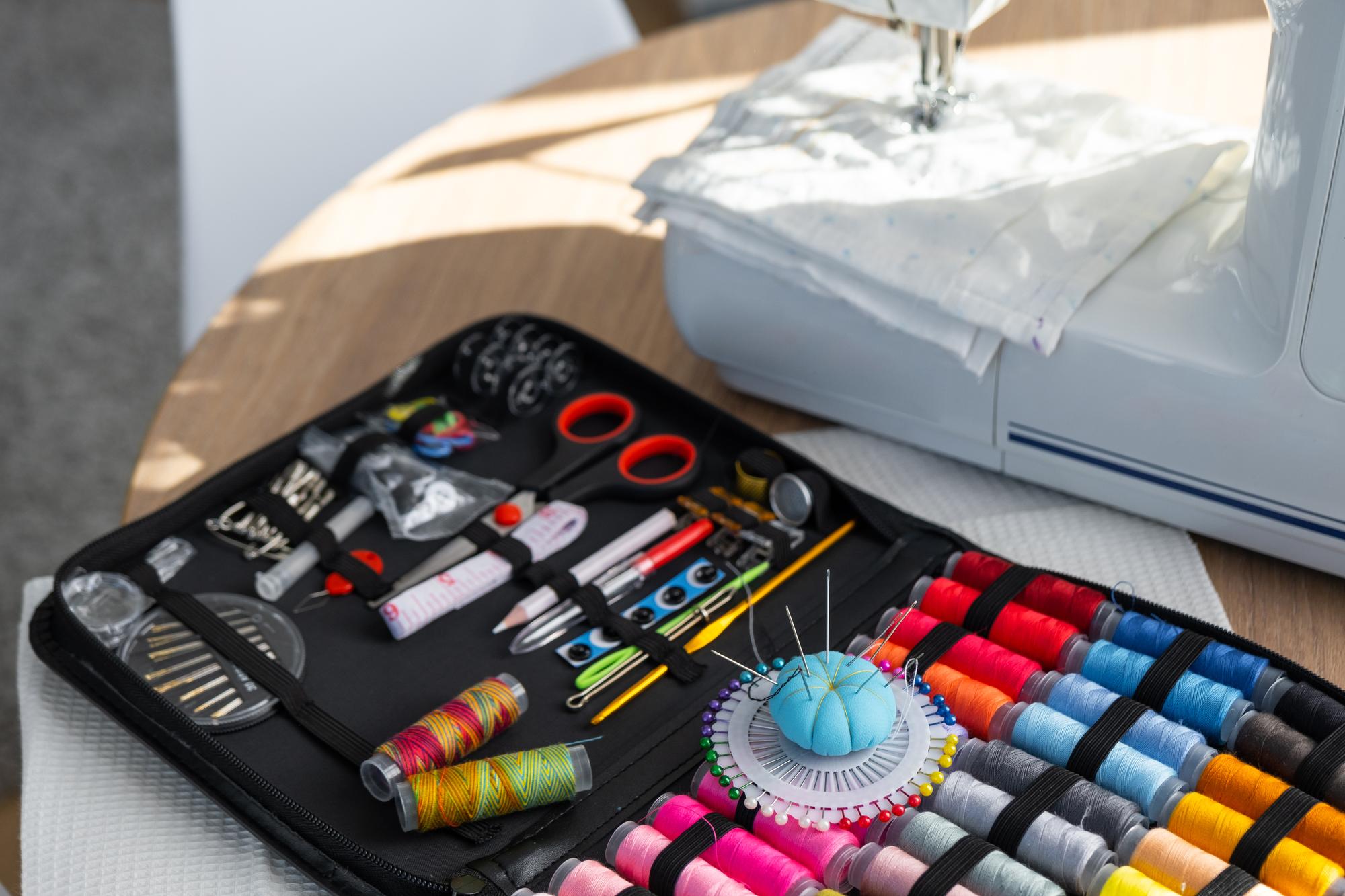 Workspace with threads, needles and sample samplers